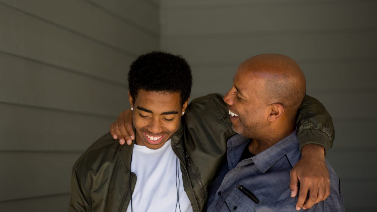 Father talking and spending time with his son.