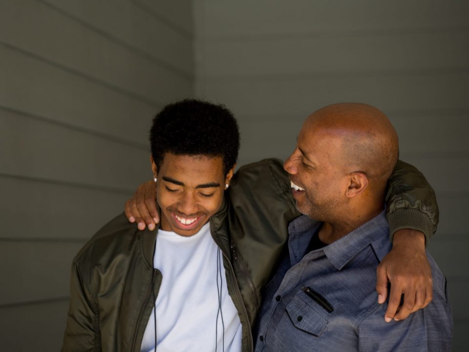 Father talking and spending time with his son.
