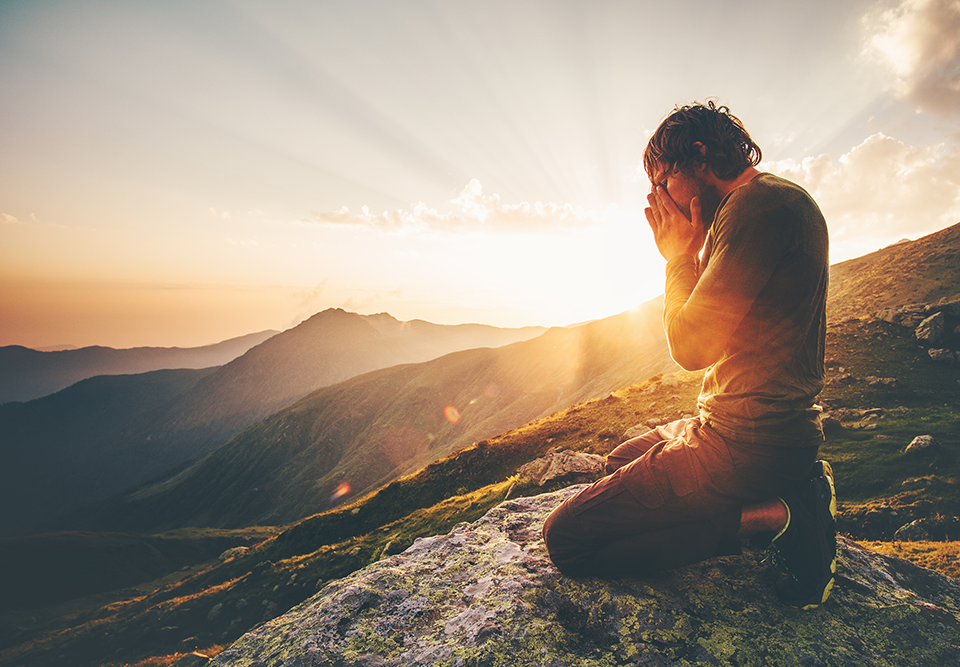 Young man sad in nature